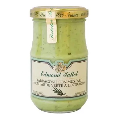 A jar of Edmond Fallot tarragon Dijon mustard with a green label and gold lid, showcasing its unique color and design.
