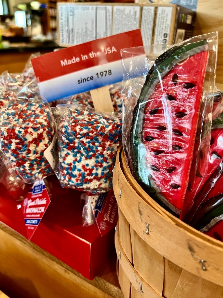 Display of patriotic-themed marshmallows and a watermelon candy in a basket, labeled 'Made in the USA since 1978'.